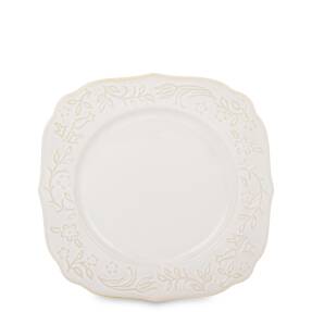 krémový okrúhly porcelánový dezertný tanier s reliéfnym kvetinovým vzorom na bielom pozadí.